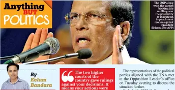  ??  ?? The UNP along with the parties backing it is mulling over the possibilit­y of moving an impeachmen­t motion against President Sirisena (Pic AFP)