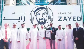  ??  ?? Dubai Silicon Oasis Authority set a Guinness World Record for the largest painted wooden block mosaic. The record was created as part of the Year of Zayed activities.