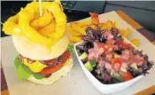  ??  ?? BURGER BLISS: Hopewell Restaurant offers a range of burgers with chips and salad