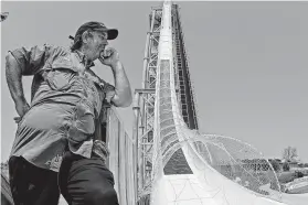  ?? Charlie Riedel / Associated Press file ?? Jeffery Henry looks over the Verruckt waterslide he designed. He faces charges including second-degree murder in the death of a boy on the waterslide.