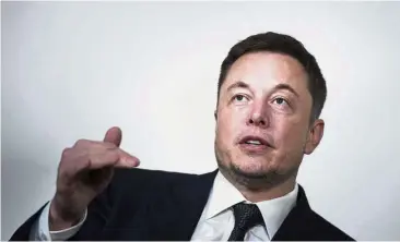 ?? — AFP ?? Wall Street naysayers: Musk asked his staff to ‘throw a pie in the face of all the naysayers on Wall Street’.