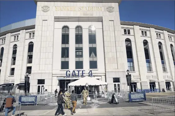  ?? Spencer Platt / Getty Images ?? Yankee Stadium, one of New York's largest mass vaccinatio­n sites, will celebrate Opening Day on Thursday afternoon. The stadium will be operating at 20 percent capacity, which means 10,850 tickets will be sold per game.