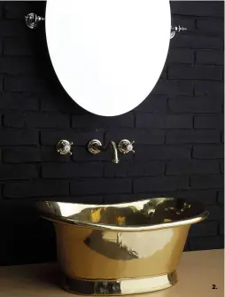  ??  ?? 1. Néo rétro Ce lavabo sur socle s’inspire des jardinière­s des années folles. Socle en métal noir ou blanc. Ø45 x H 87 cm.
Design Norm.Architects. « Stand », 1170 €, Lovely Market.