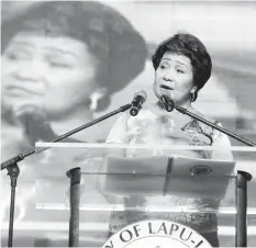  ??  ?? Lapu-Lapu City Mayor Paz Radaza delivers her State of the Children's Report at Hoopsdome. JOY TORREJOS