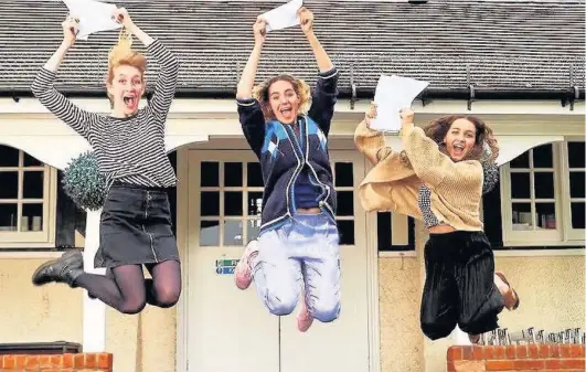  ??  ?? Jumping for joy: students celebrate their bumper crop of results at Northwood College for Girls