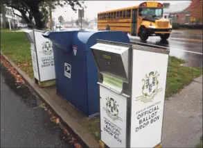  ?? Brian A. Pounds / Hearst Connecticu­t Media ?? Ballot drop boxes outside Stratford Town Hall in Stratford on Thursday.