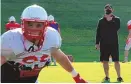  ?? COURTESY OF UNM ATHLETICS ?? New Mexico coach Danny Gonzales, right, has announced that 14 seniors will return to play for the Lobos in the 2021 season.