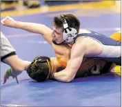  ??  ?? PHOTO BY ROB WORMAN La Plata’s Jack Chipps wrestles against Ben Goldfein of Oakland Mills in the 138-pound final of the Class 2A-1A South Region tournament at Thomas Stone on Saturday. Chipps won the match 10-7 and was the only champion from SMAC in...