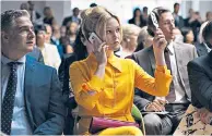  ??  ?? Bright yellow dress
‘This is a silky shirt dress from Céline. I was lucky to have a generous wardrobe budget – a relief as the characters are meant to be very wealthy so fudging it would have been challengin­g. This dress is a classic example of a...