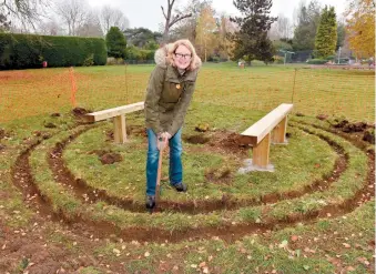  ?? ?? Kathryn Baker, a member of the team behind the memorial garden, at the site in Riverside Gardens. Ref:134053-5