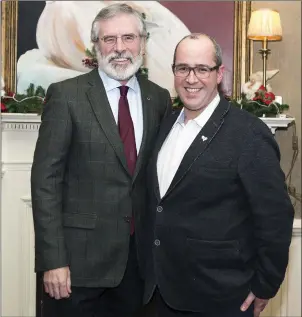  ??  ?? Councillor Chris MacManus is pictured with Sinn Féin leader, Gerry Adams at a function in the Great Southern Hotel, Sligo.