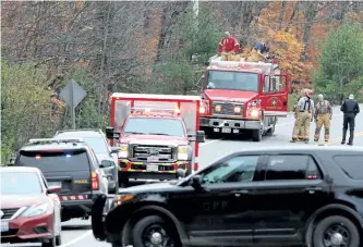  ?? PETE FISHER/POSTMEDIA NETWORK ?? A fatal motorcycle collision shut down through traffic on Highway 60 in Algonquin Park, north of Peterborou­gh, on Saturday.