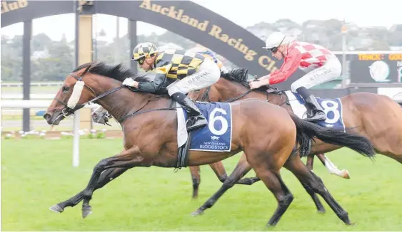  ?? Photo / Trish Dunell ?? Opie Bosson and Probabeel (6) down stablemate Yourdeel (obscured) while Hasstobego­od (8) takes 3rd place at Ellerslie yesterday.