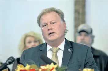  ?? TIMOTHY D. EASLY/THE ASSOCIATED PRESS ?? Kentucky State Rep., Republican Dan Johnson addresses the public from his church on Tuesday, regarding allegation­s of sexual assault dating to 2013. On Wednesday, he committed suicide.