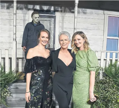  ?? KEVIN WINTER GETTY IMAGES ?? Andi Matichak, Jamie Lee Curtis and Judy Greer: three generation­s of Strode women in one narrative pays off in new Halloween.