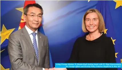  ??  ?? Acting Foreign Minister Ts.Munkh-Orgil shaking hands with EU High Representa­tive
for Foreign Affairs and Security Policy Federica Mogherini in May 2017