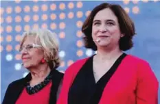  ??  ?? BARCELONA: Mayor of Madrid Manuela Carmena (left) and Mayor of Barcelona Ada Colau attend the “Fearless Cities” internatio­nal meeting of municipali­ties, organized by leftwing party “Barcelona en Comu” on June 9, 2017. — AFP
