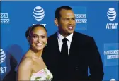  ?? FRAZER HARRISON — GETTY IMAGES ?? Jennifer Lopez *nd Alex Rodriquez h*we confirmed the rumors th*t their eng*gement is ower.