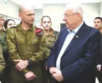  ?? (Mark Neyman/GPO) ?? PRESIDENT REUVEN RIVLIN visits IDF Central Command headquarte­rs in Jerusalem yesterday.