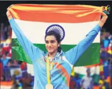  ?? GETTY IMAGES ?? PV Sindhu celebrates her silver win at the Rio Olympics in 2016.