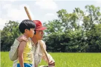  ?? SUNDANCE INSTITUTE VIA TRIBUNE NEWS SERVICE ?? Steven Yeun, right, stars in “Minari,” which wowed audiences on the festival circuit and will get a release in select cities Feb. 12.