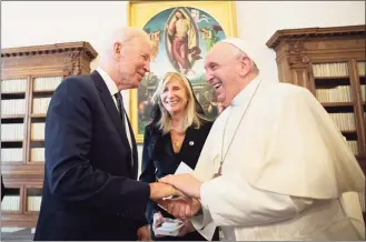  ?? Divisione Produzione Fotografic­a / Associated Press ?? President Joe Biden shakes hands with Pope Francis as they meet at the Vatican on Friday.