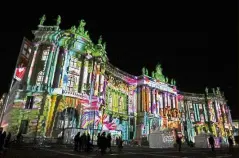  ??  ?? Germany: The law faculty building at Humboldt University in Berlin is illuminate­d during the Festival of Lights. Berlin turned into a city of light art with the opening of the festival, which will run until Oct 15. — Xinhua