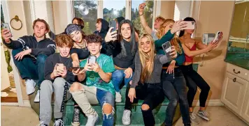  ?? (NYT pictures) ?? Hype House, a TikTok content creator collective, that has 19 members, many of whom are pictured here, in Los Angeles on Dec. 27, 2019.