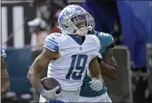  ?? PHELAN M. EBENHACK — THE ASSOCIATED PRESS, FILE ?? Wide receiver Kenny Golladay (19) celebrates a reception during the second half of an Oct. 18game between the Lions and Jaguars in Jacksonvil­le, Fla. A person with knowledge of the deal told The Associated Press that the Giants have worked out a contract with him.