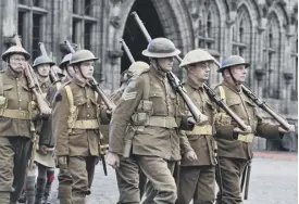  ??  ?? 0 Living history actors in First World War uniforms in Mons, Belgium