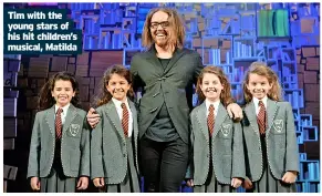  ?? ?? Tim with the young stars of his hit children’s musical, Matilda