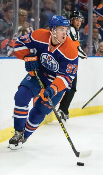  ?? STRINGER/CANADA/REUTERS ?? No. 1 draft choice Connor McDavid will certainly help the Oilers on their climb back to respectabi­lity this season.