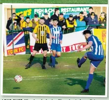  ??  ?? LONG SHOT: Wroxham’s Jordan King shoots from distance