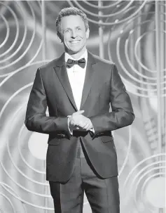  ??  ?? Seth Meyers hosts the 75th Golden Globe Awards in Beverly Hills, California on Sunday. — Reuters photo