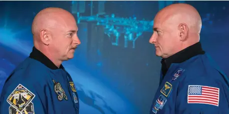  ??  ?? Nasa astronaut brothers Scott and Mark Kelly