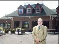  ?? Ned Gerard / Hearst Connecticu­t Media ?? Developer John Guedes in front of the Riverview Retail Center, under constructi­on in Shelton.