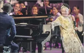  ?? Brian van der Brug Los Angeles Times ?? BOWL’S program changes brought singer Omara Portuondo, 87, to center stage.