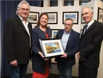  ?? From left, ?? Grace O’Donnell (Go Kerry) officially opening the Ardfert Camera Club’s Photograph­ic Exhibition in Kerry County Library Tralee on Tuesday evening. Steve Baker, Grace O’Donnell, Francis Foley and Tom O’Connor (Kerry County Librarian).