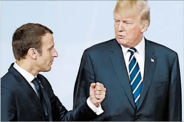  ?? MICHAEL SOHN/AP ?? French President Emmanuel Macron two weeks ago invited President Donald Trump to attend Bastille Day celebratio­ns.