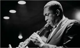  ??  ?? John Coltrane performing (year unknown) as seen in Fire Music. Photograph: Photo credit: Lee Tanner. Image courtesy of Submarine Deluxe