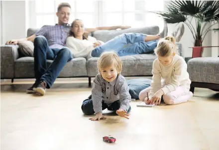  ?? — GETTY IMAGES FILES ?? Being an intentiona­lly lazy parent means instead of doing things for children, parents set out a structure of activities, then push the child to complete the tasks on their own.