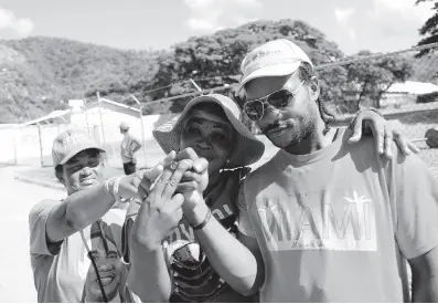  ?? FILE ?? PNP and JLP supporters pose for a photo after casting their vote during the local government election in 2016. Peter Espeut writes: ... there is a good reason for the disaffecte­d to turn out to vote this time – for the lesser of two evils.