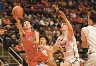  ?? ?? Parkland’s Jayden Thomas puts up a shot as Central York’s Ben Rill defends on Saturday.