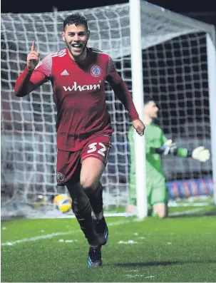  ?? Gareth Copley ?? Dion Charles celebrates his hat-trick