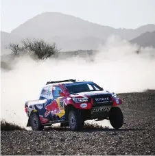  ?? — AFP photo ?? Toyota’s driver Nasser Al-Attiyah of Qatar and his co-driver Mathieu Baumel of France compete during the Stage 2 of the Dakar 2020.