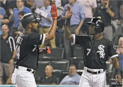  ?? DAVID BANKS/GETTY IMAGES ?? The Sox lineup, which already featured Eloy Jimenez (left) and Tim Anderson, now has Yasmani Grandal, Edwin Encarnacio­n and Nomar Mazara.