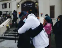  ?? NHAT V. MEYER — STAFF PHOTOGRAPH­ER ?? Jason, who did not give a last name, chairman of Black Outreach, gets a hug as people gather in reaction to the guilty verdict of Minneapoli­s police officer Derek Chauvin in the death of George Floyd at Grace Baptist Church in downtown San Jose on Tuesday.