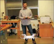  ??  ?? Kutztown High School Engineerin­g and Technology teacher Zachary Rudy flies his drone at the KASD STEAM launch event on Feb. 16.