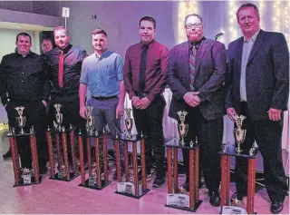  ?? MELISSA SMITS/SPECIAL TO THE EXAMINER ?? Brad Lavalle (left), Corey Strawn, Nicholas Ledson, Nolan Gould, Dan McHattie and Mark Gordon were among the drivers honoured at the Peterborou­gh Speedway annual awards night on Saturday.