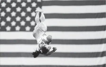  ?? ASSOCIATED PRESS FILE PHOTO ?? Olympic champion Simone Biles competes on the vault during the U.S. Classic gymnastics competitio­n July 28 in Columbus, Ohio.